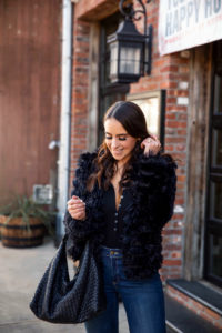 Blogger Sarah Lindner of The House of Sequins wearing faux fur cardigan from Amazon.