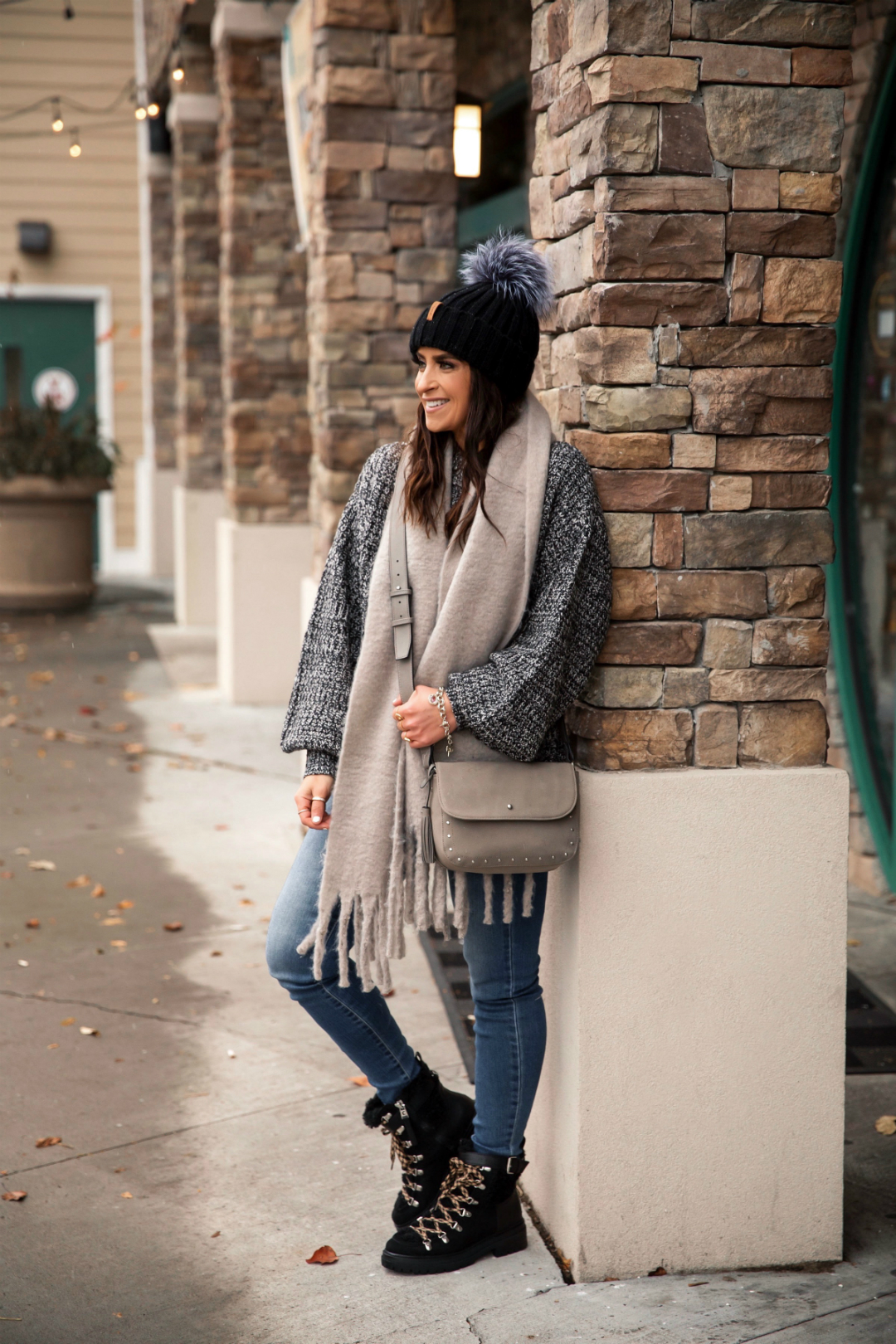 Blogger Sarah Lindner of The House of Sequins styling a fall outfit with chunky knits from Walmart