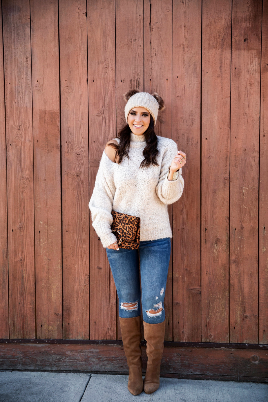 Blogger Sarah Lindner of The House of Sequins wearing cutout sweater from Express