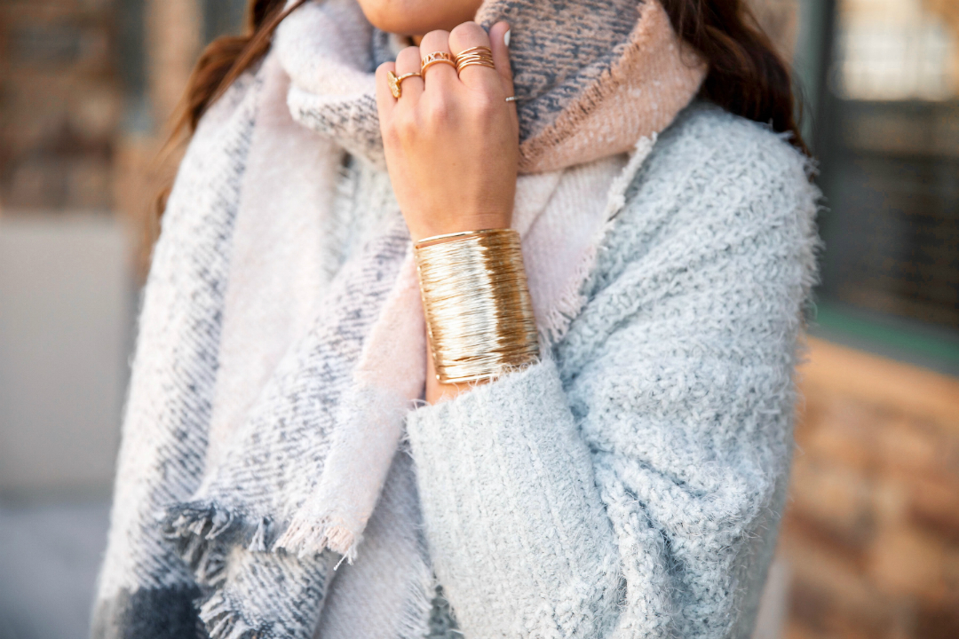 Blogger Sarah Lindner of The House of Sequins wearing fall outfit with mock neck sweater from Express.