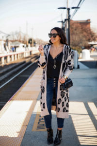 Blogger Sarah Lindner wearing a leopard cardigan from Amazon