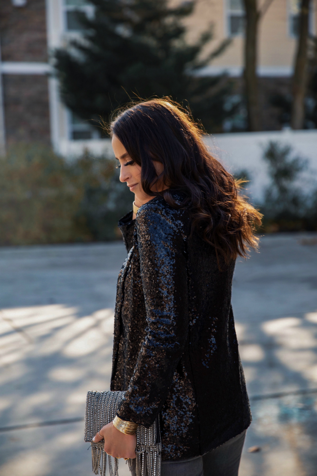 Blogger Sarah Lindner of The House of Sequins wearing a sequin blazer look from Express