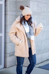 Blogger Sarah Lindner of The House Of Sequins wearing a camel sherpa teddy coat from Walmart