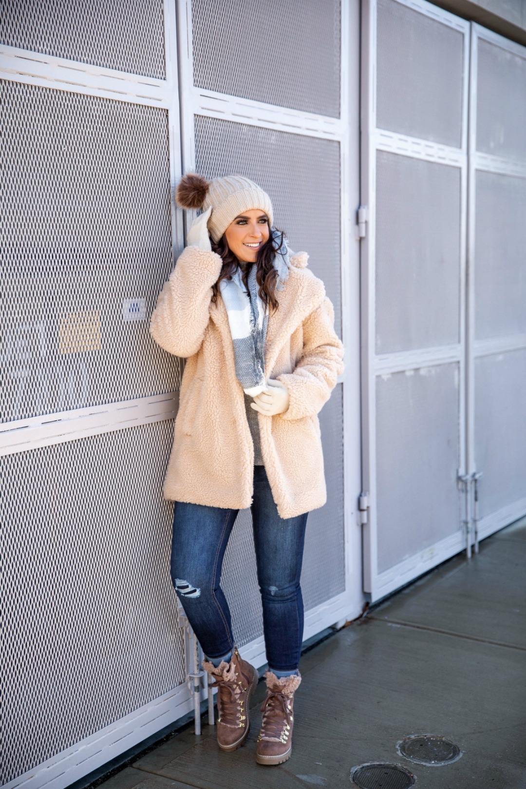 Blogger Sarah Lindner of The House Of Sequins wearing a camel sherpa teddy coat from Walmart