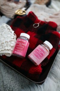 Blogger Sarah Lindner of The House of Sequins featuring Glow Habit Vitamin Gummies from Walmart