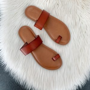 Blogger Sarah Lindner of The House of Sequins reviewing slide sandals from Target.