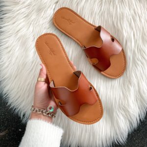 Blogger Sarah Lindner of The House of Sequins reviewing slide sandals from Target.
