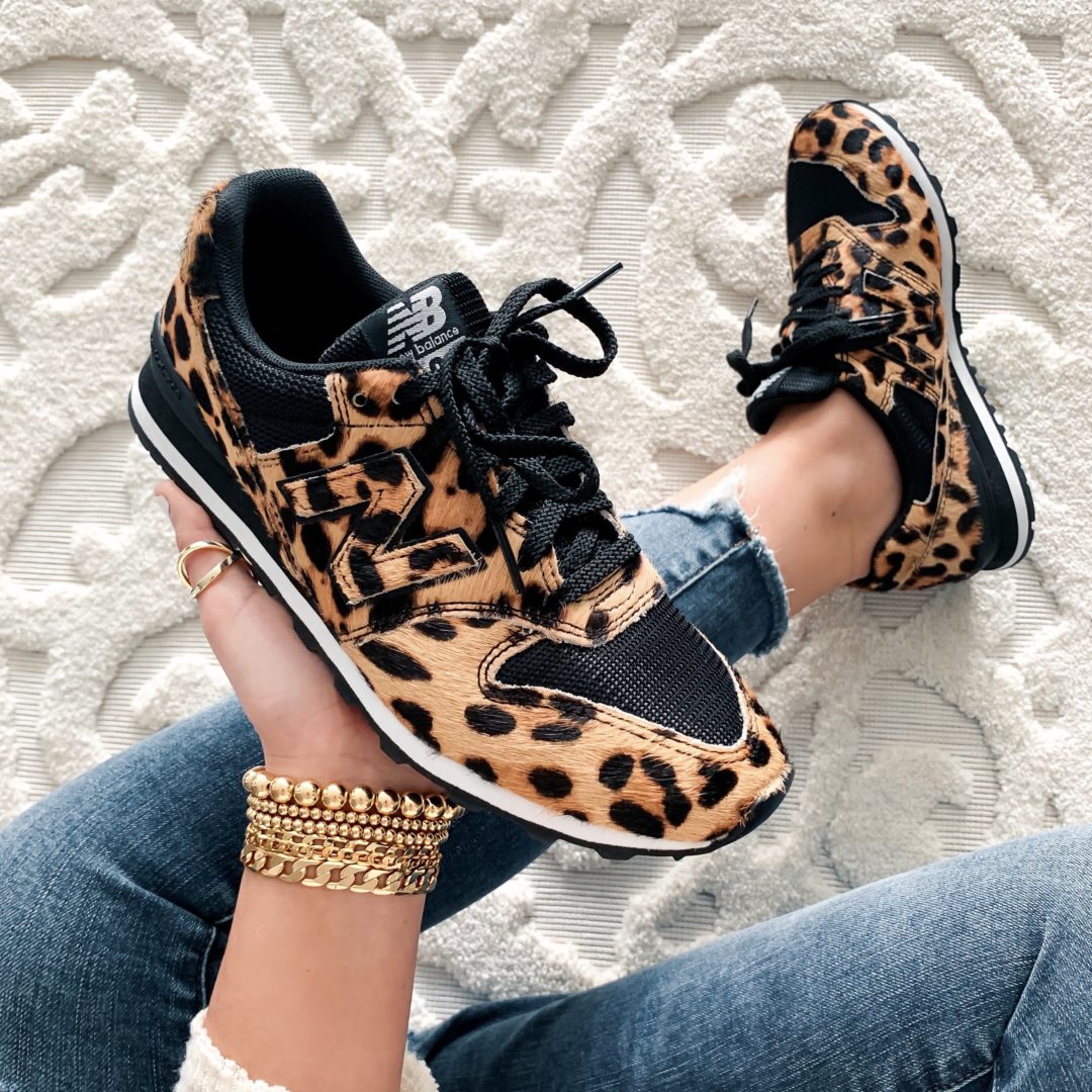 Blogger Sarah Lindner of The House of Sequins wearing leopard print new balance sneakers.