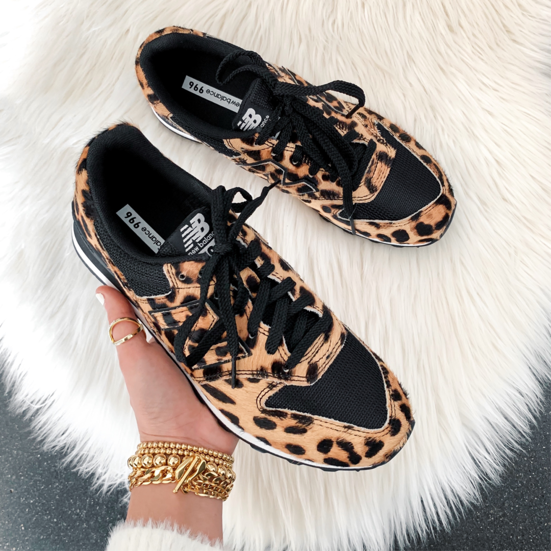 Blogger Sarah Lindner of The House of Sequins wearing leopard print new balance sneakers.