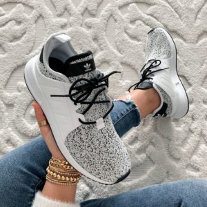 Blogger Sarah Lindner of The House of Sequins sharing Adidas athletic sneakers.