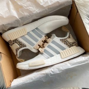 Blogger Sarah Lindner of The House of Sequins sharing leopard print Adidas sneakers.