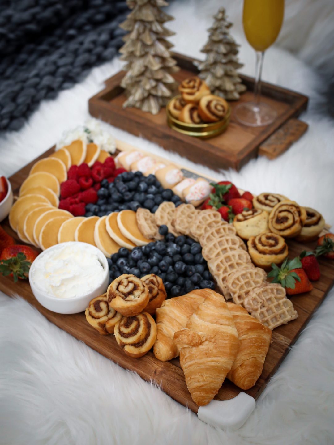 Blogger Sarah Lindner of The House of Sequins sharing a breakfast charcuterie board made with help of Walmart+ membership.
