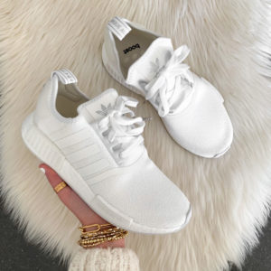 Blogger Sarah Lindner of The House of Sequins sharing an Adidas sneaker haul.
