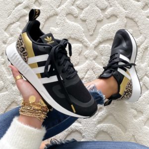Blogger Sarah Lindner of The House of Sequins sharing new Adidas sneakers.