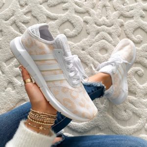 Blogger Sarah Lindner of The House of Sequins sharing Spring Adidas leopard sneakers.