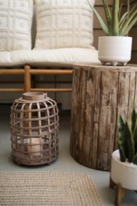 Blogger Sarah Lindner of The House of Sequins styling a small space patio with pieces from Amazon Home, Target Home and Walmart Home.
