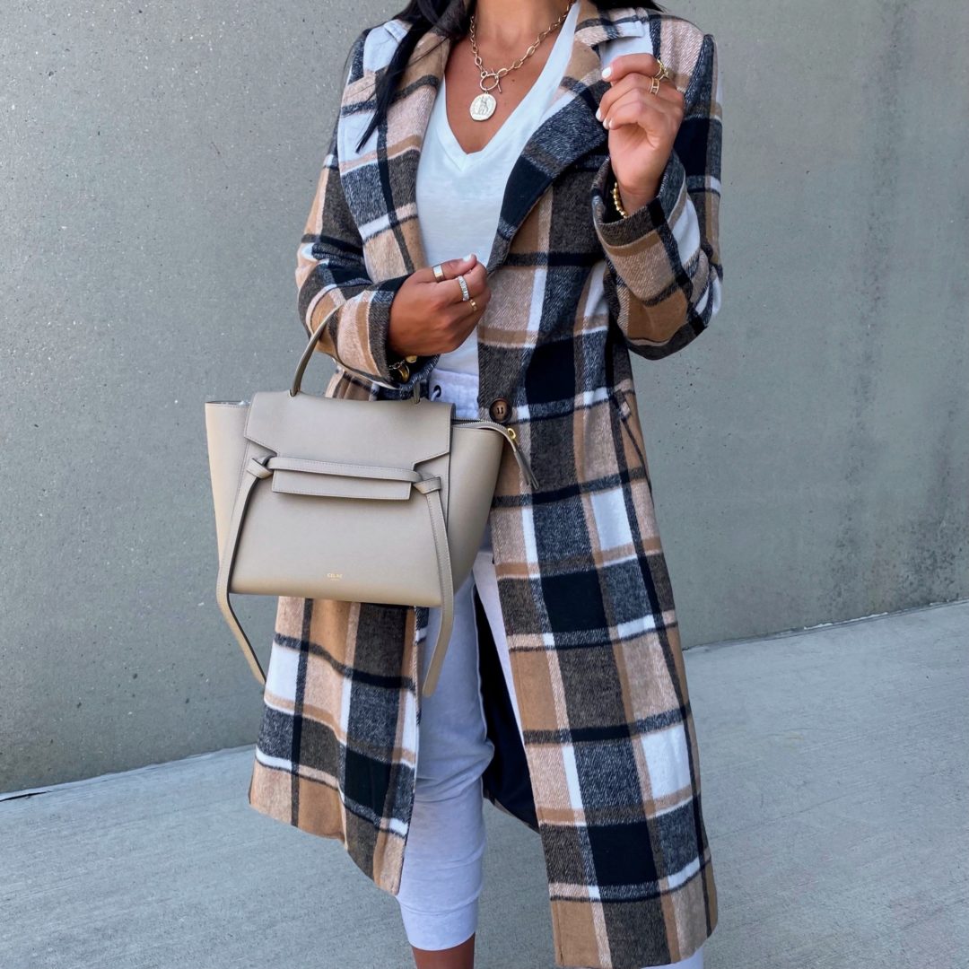 Blogger Sarah Lindner of The House of Sequins styling a plaid coat.