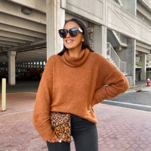 Blogger Sarah Lindner of The House of Sequins styling fall sweater outfits.