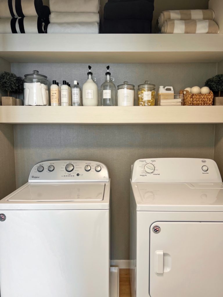 Blogger Sarah Lindner of The House of Sequins sharing Amazon Home Laundry Room organization and storage.