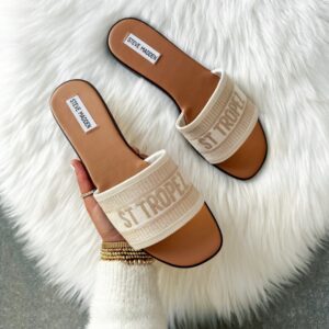Blogger Sarah Lindner of The House of Sequins sharing summer sandals.
