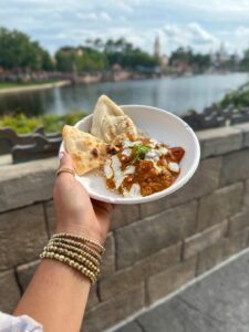 Blogger Sarah Lindner of The House of Sequins sharing Disney Epcot Food and Wine Festival eats.